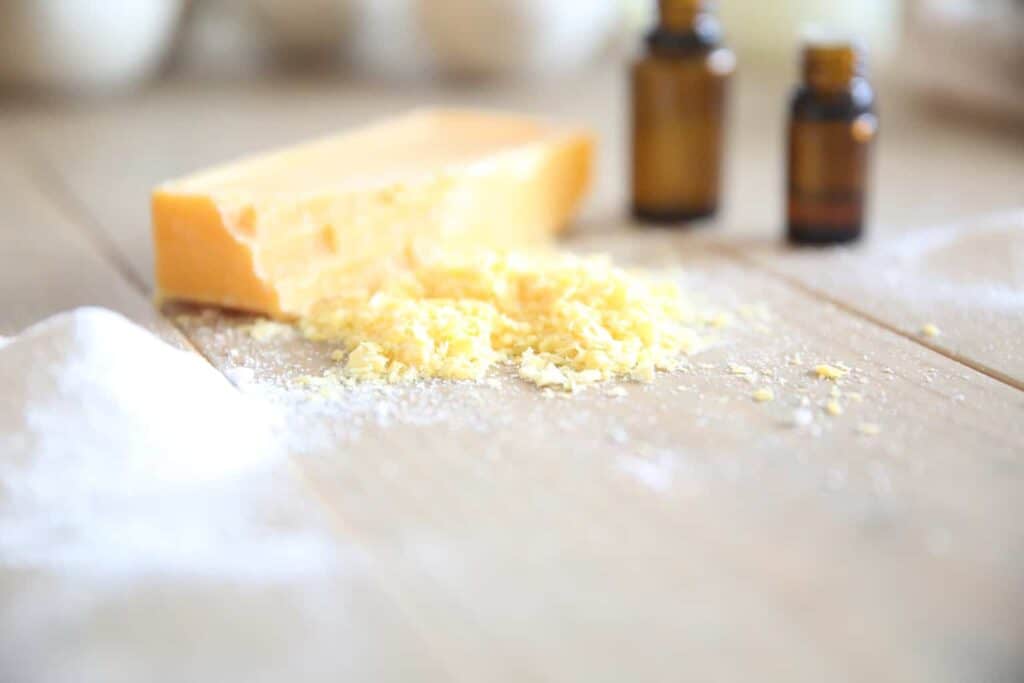 Shedded soap bar and essential oil bottles.