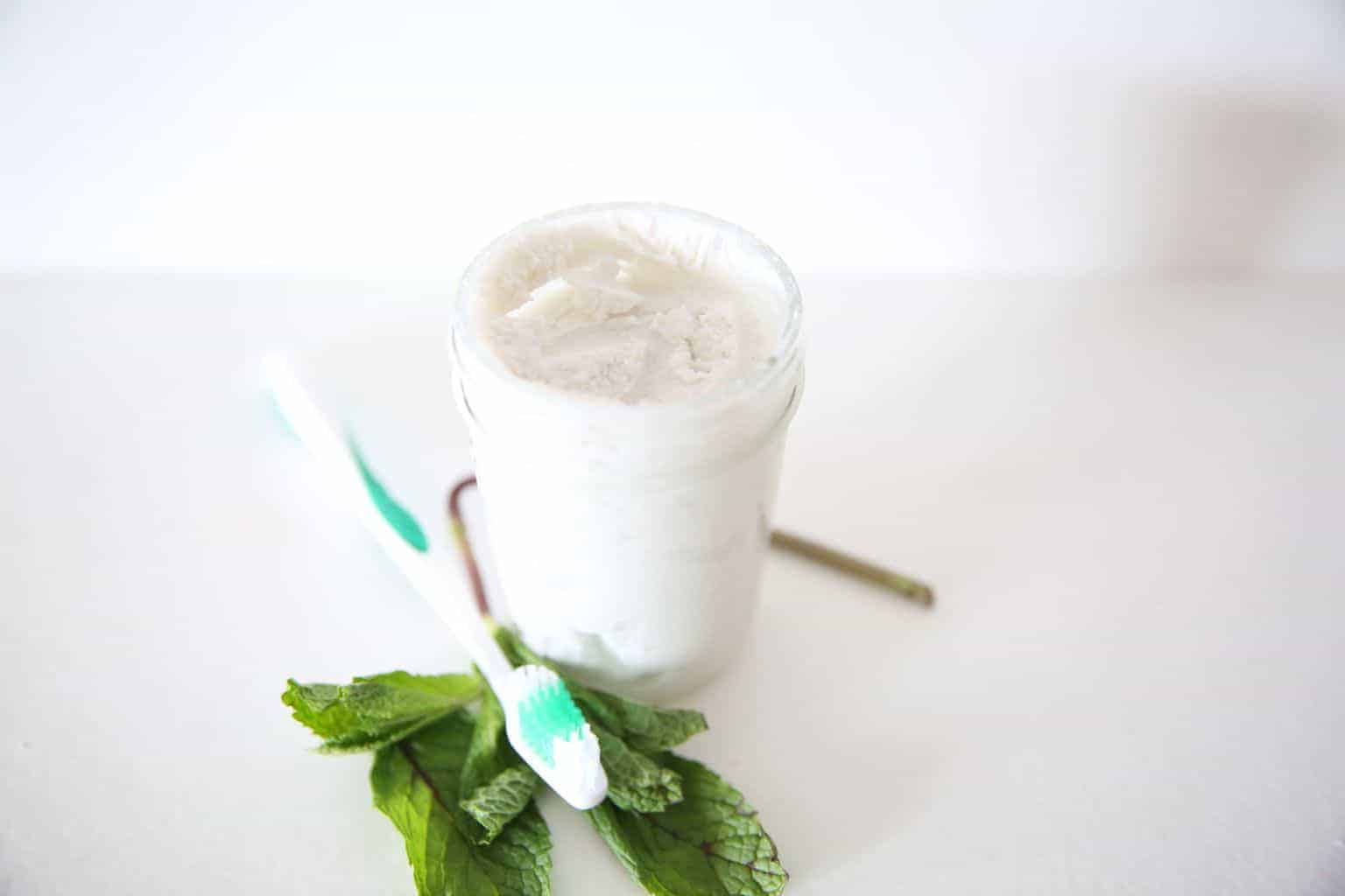 homemade toothpaste in glass jar