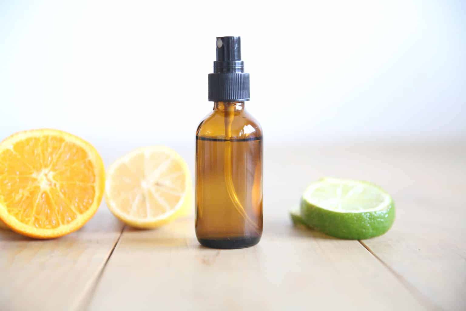 homemade citrus perfume in glass spray bottle
