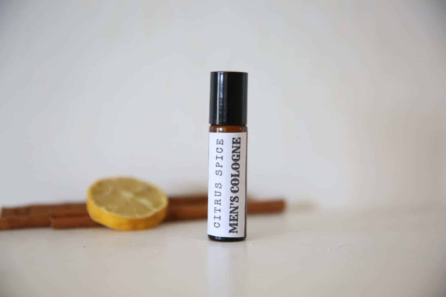 Homemade mens cologne in 10ml roller bottle. with dried lemon and cinnamon stick