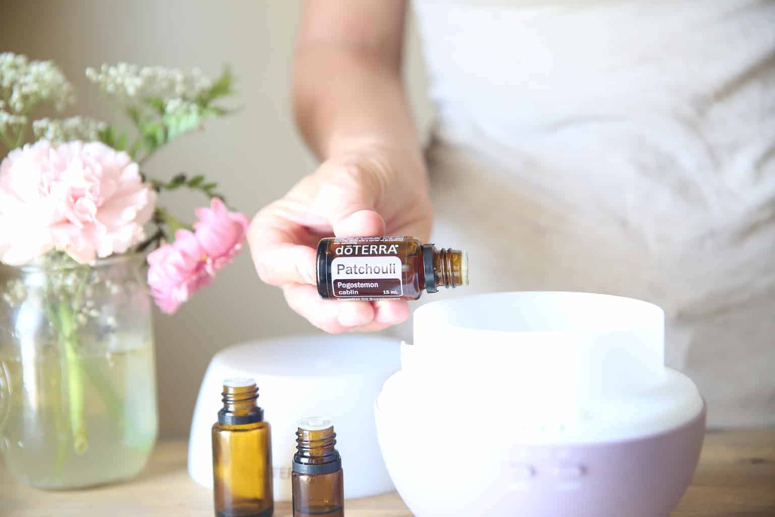 Adding patchouli essential oil to a doterra diffuser