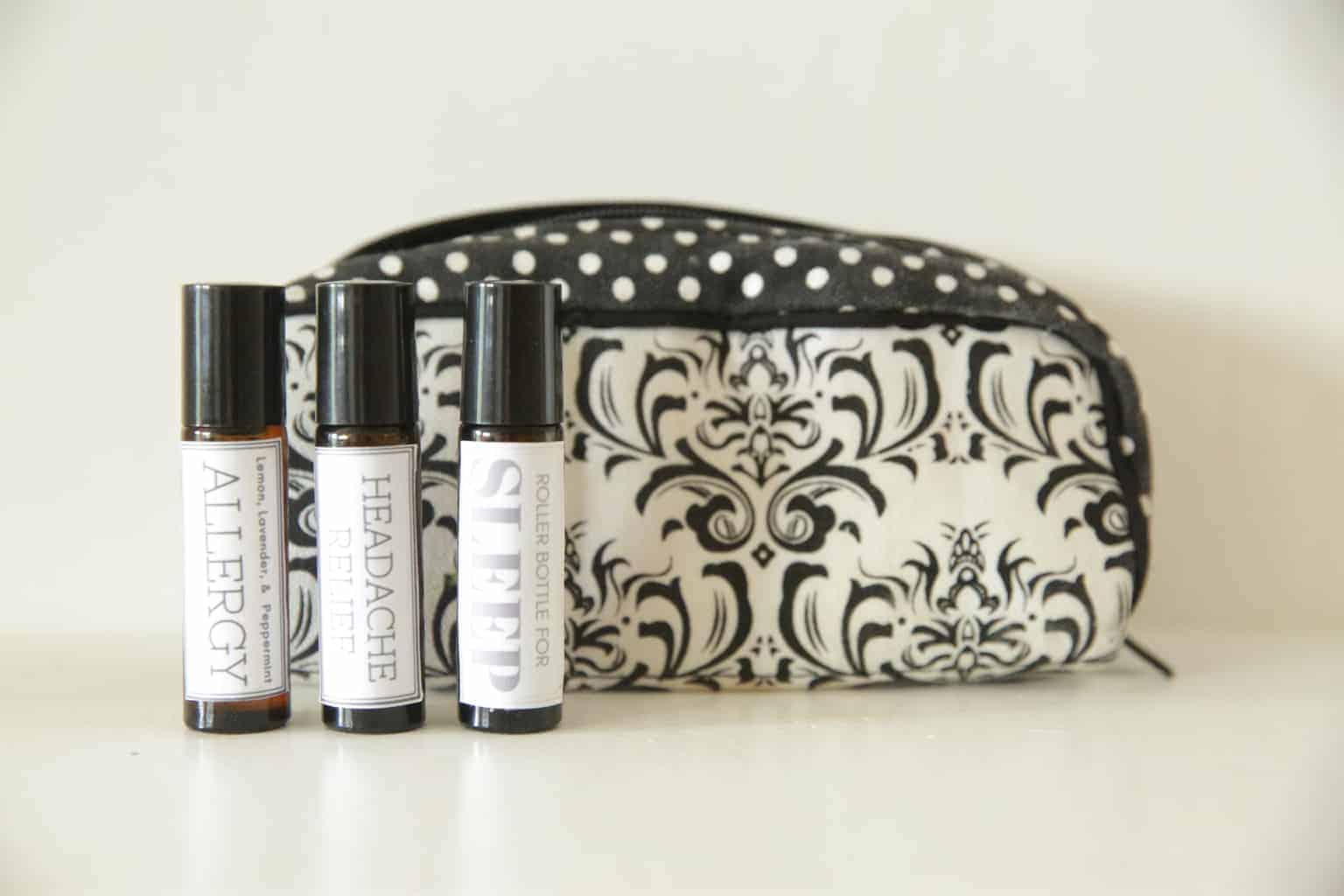 essential oil travel bag with 3 homemade rollerball blends