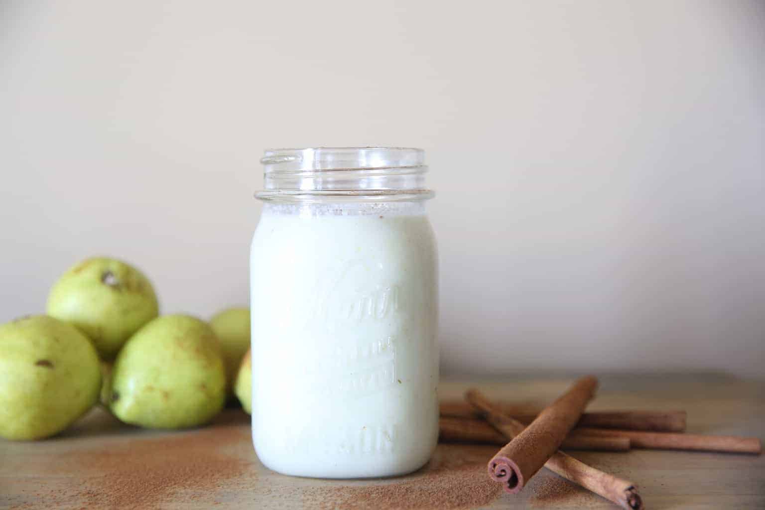 cinnamon pear smoothie in glass mason jar