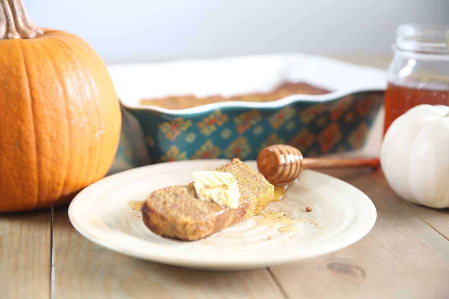 Paleo Pumpkin Bread with butter, cinnamon and honey 