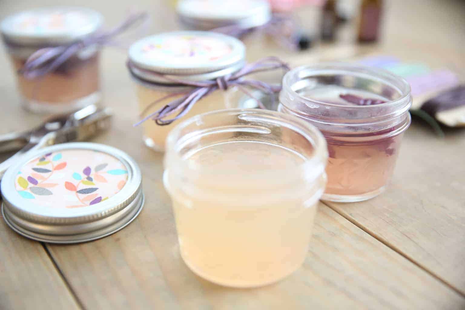 Adding bows and decorative ingredients to the diy gel air fresheners. 