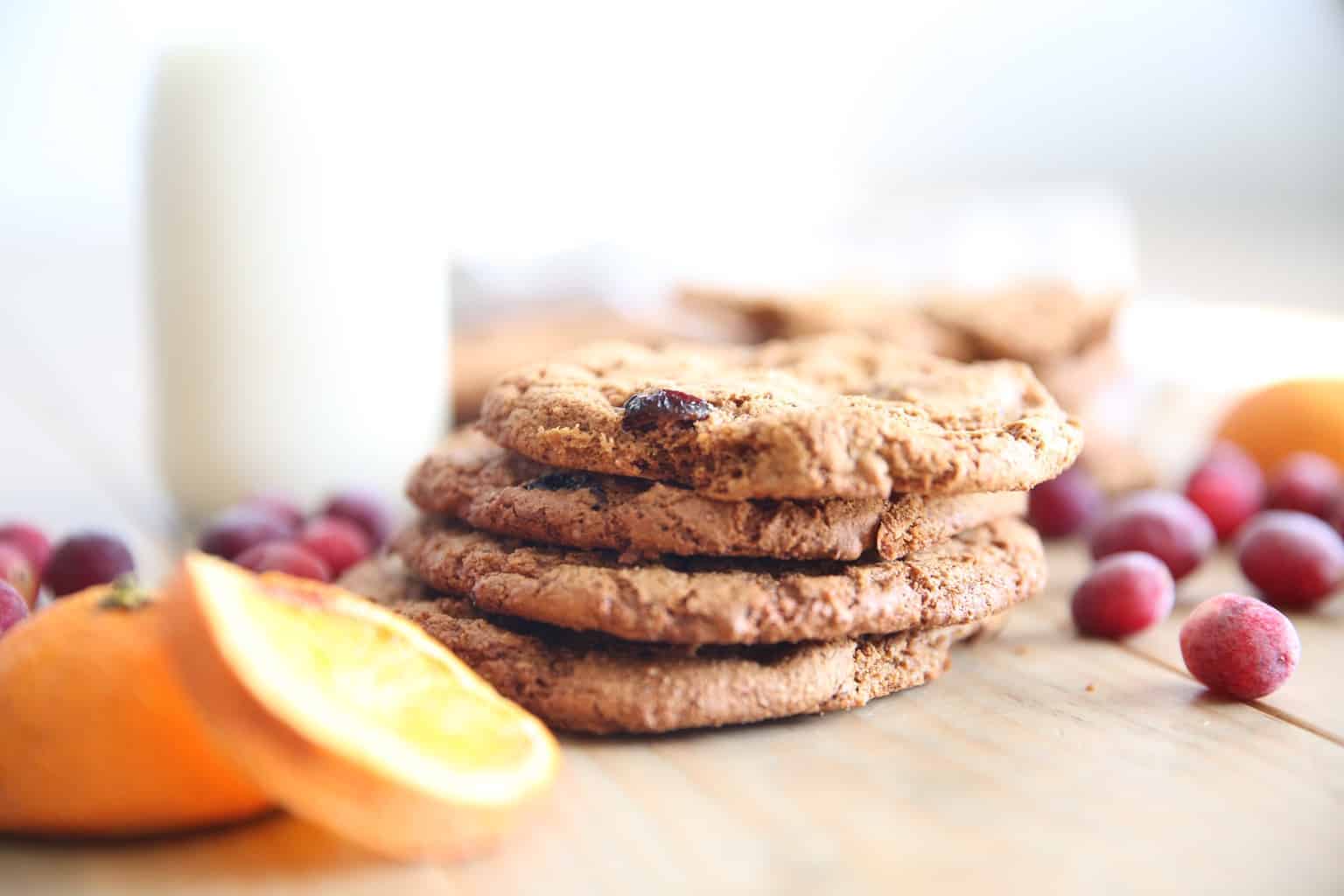 Homemade cranberry cookies on wood table.