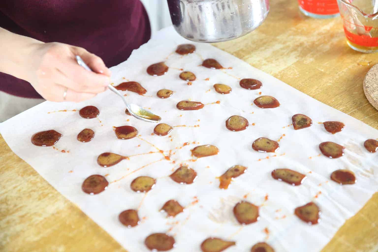 Parchment paper with homemade cough drops.