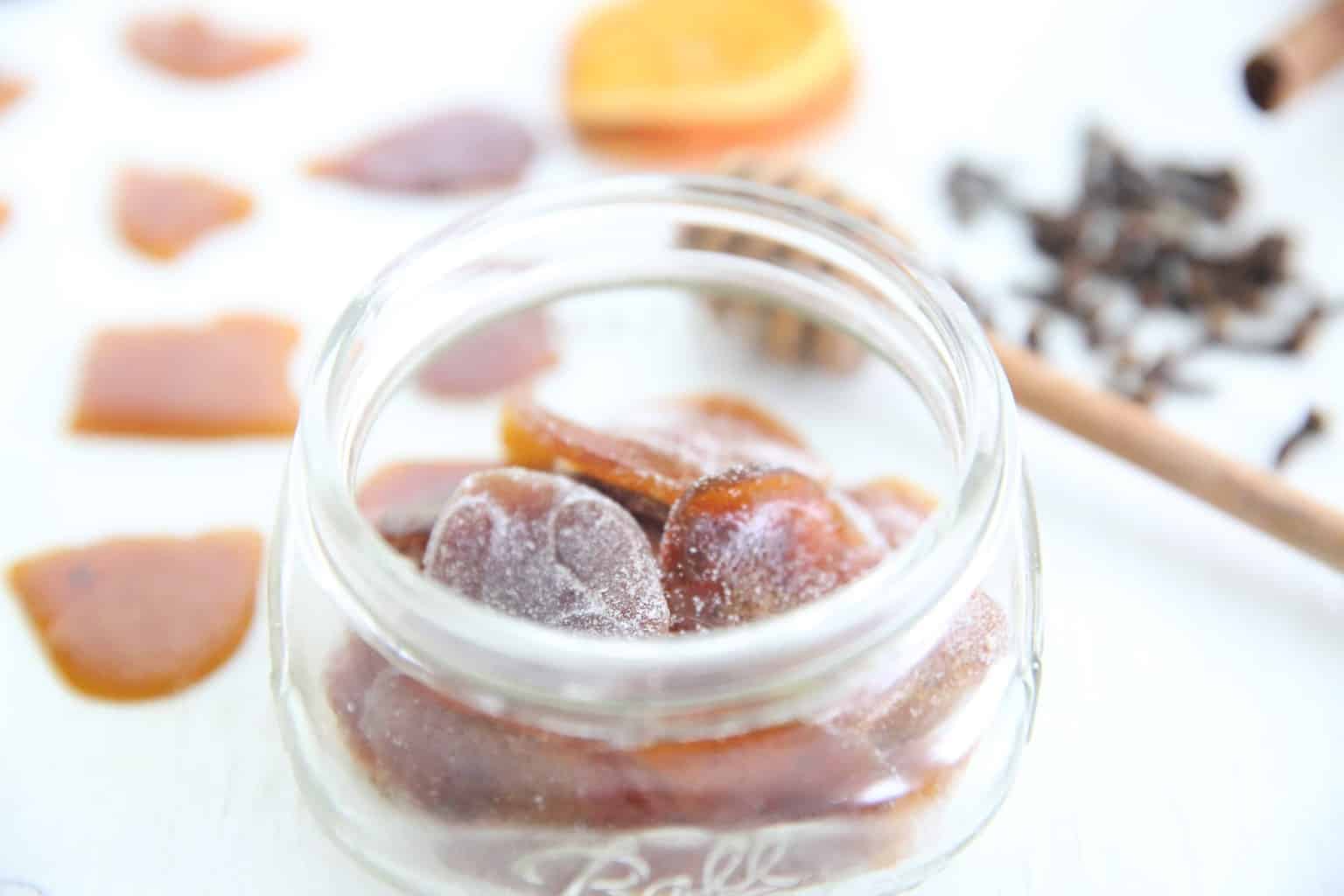 Homemade cough drops in mason jar.