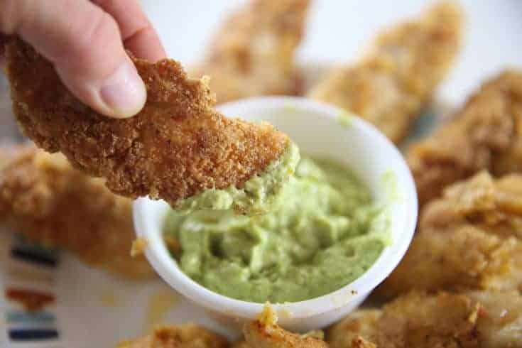 Learn how to make whole 30 approved chicken strips with almond flour, arrowroot powder, and spices. Gluten free and dairy free chicken strips.