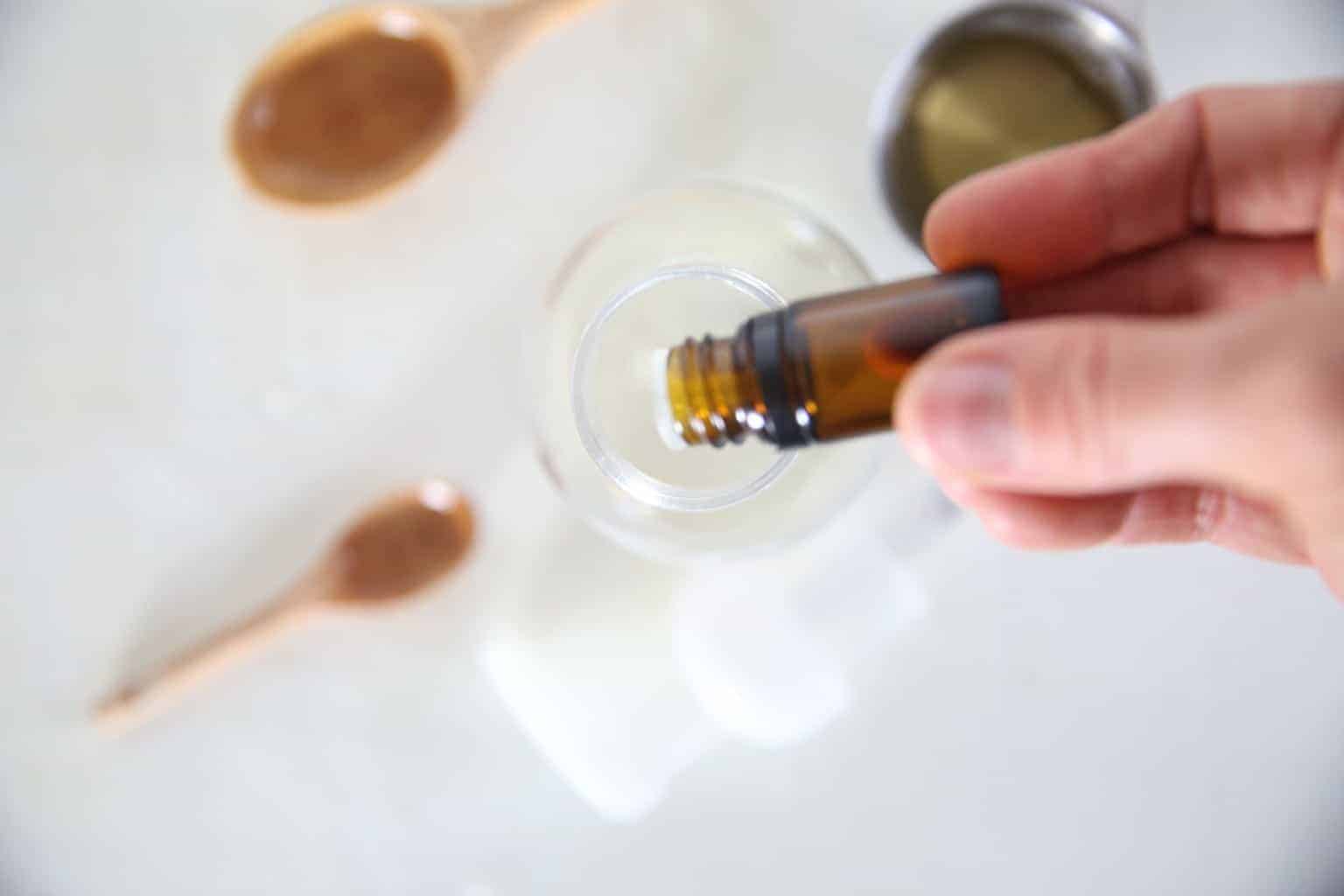 Adding essential oils to a foaming soap dispenser for a baby wash.