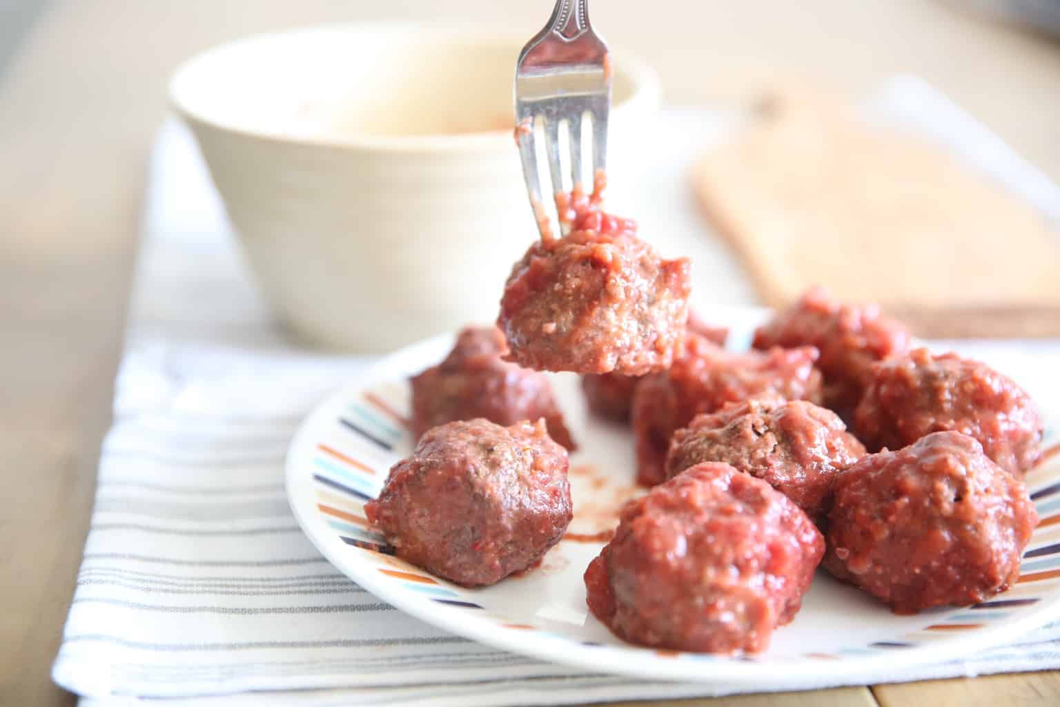Gluten free and dairy free meatballs on a white plate