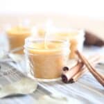 Homemade beeswax candles with cinnamon sticks.