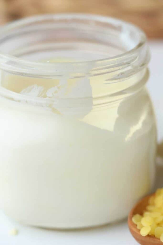 Homemade sunscreen in widemouth mason jar.