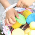 Easter Morning Basket filled with playdough and plastic eggs.