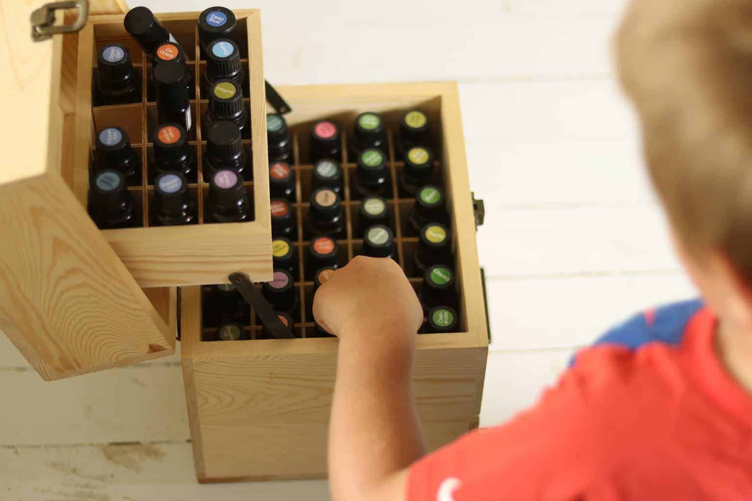 Essential oil storage box filled with essential oil bottles.