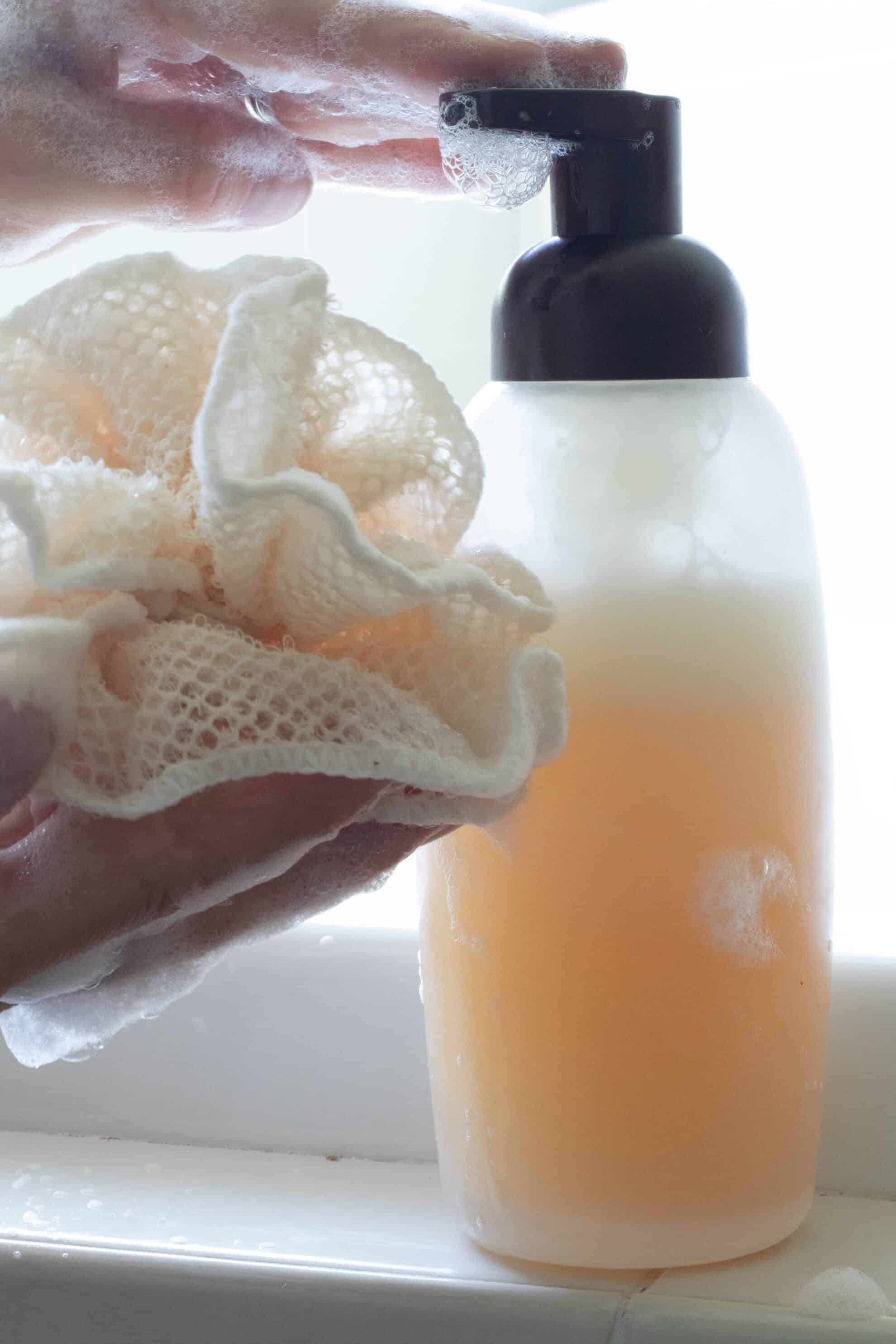 Foaming body wash with shower scrubber.