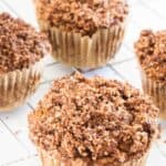 pumpkin muffins with crumble topping on cooling wire rack