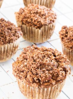 pumpkin muffins with crumble topping on cooling wire rack