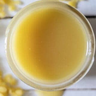 yellow vapor rub in small mason jar