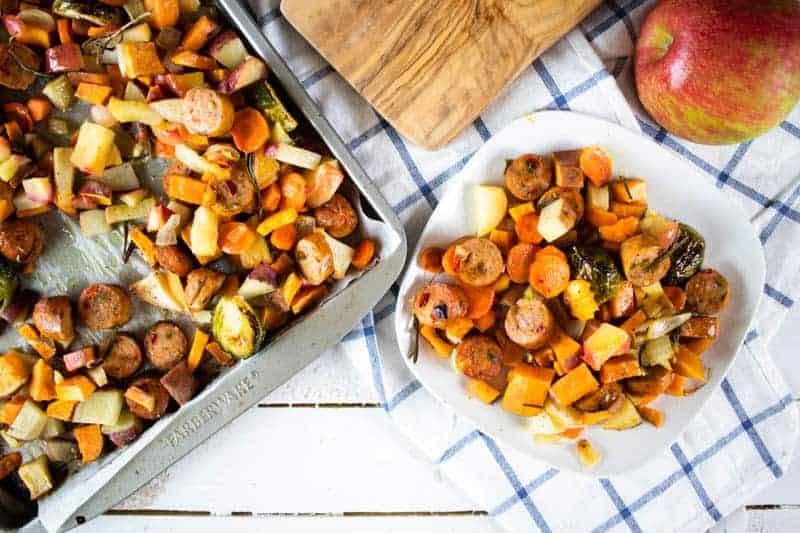 Roasted vegetables on sheet pan and dinner plate.