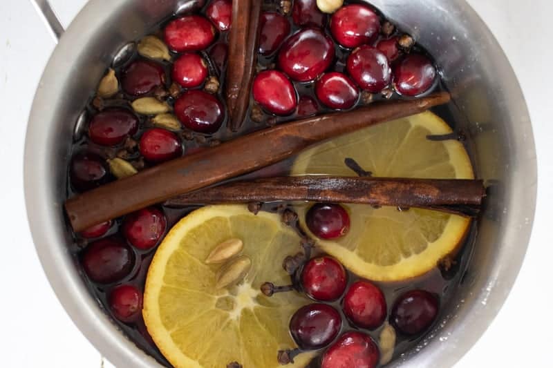 Homemade potpourri in saucepan on table.