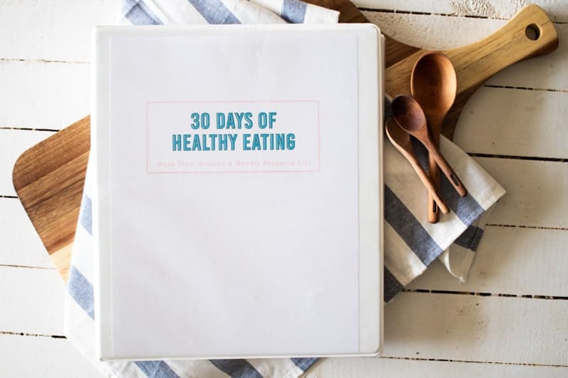 cookbook laying on cutting board