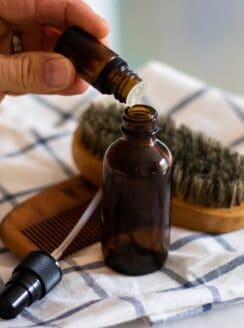 Adding essential oils to aftershave.