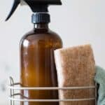 Homemade granite cleaner with tan sponge.