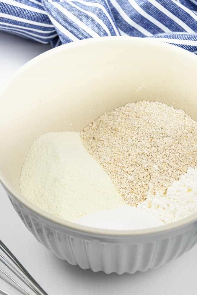 White and cream powders in white bowl.