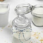 DIY oatmeal milk bath dried ingredients in a storage jar.