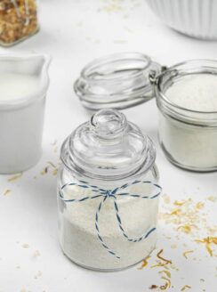 DIY oatmeal milk bath dried ingredients in a storage jar.