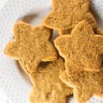 white plate of coconut sugar star shaped cookies