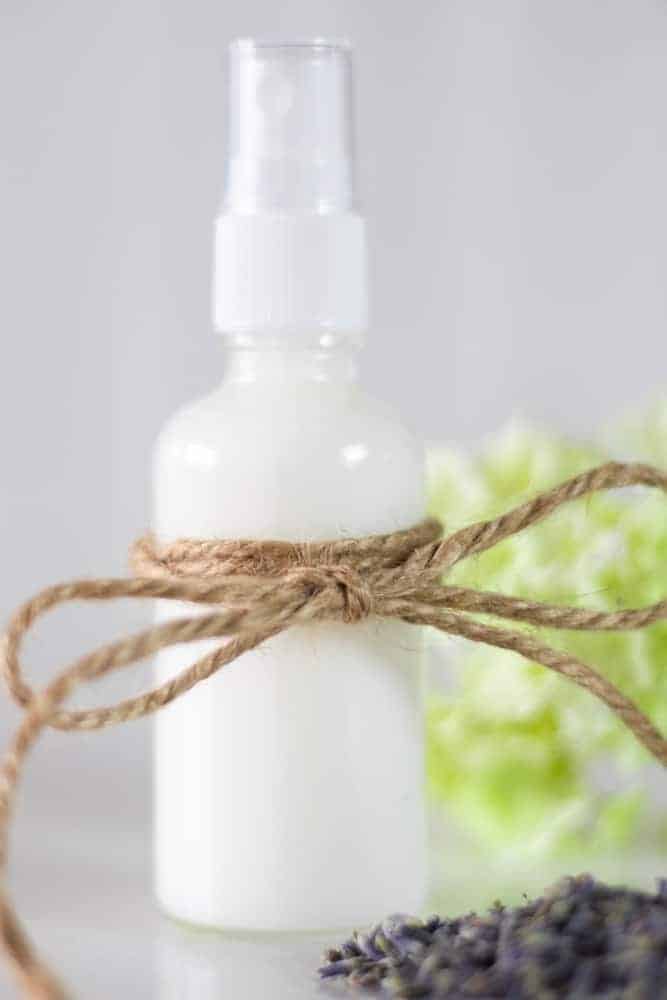 leave-in condoner in glass spray bottle wrapped in hemp