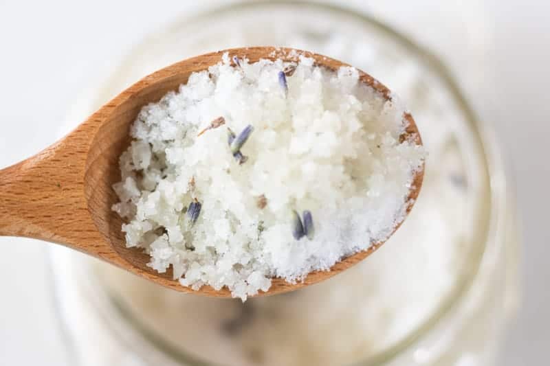 detoxifying salt bath in wooden spoon