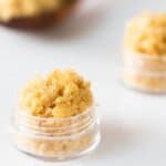 Brown sugar lip scrub in small container.