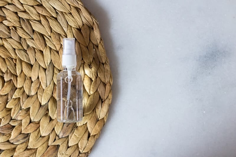 diy hair growth spray in glass spray bottle