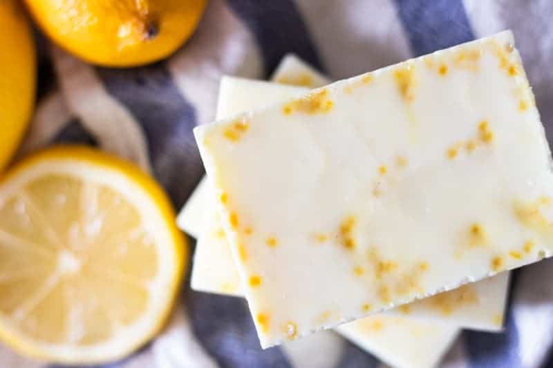 diy soap bars on towel with lemon slices.