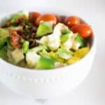 healthy cobb salad in white bowl