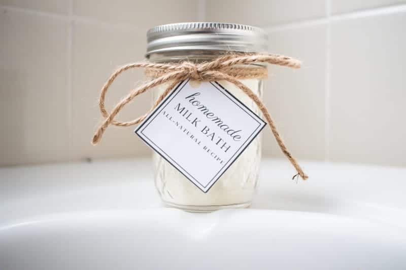 jar of powdered milk bath with gift tag