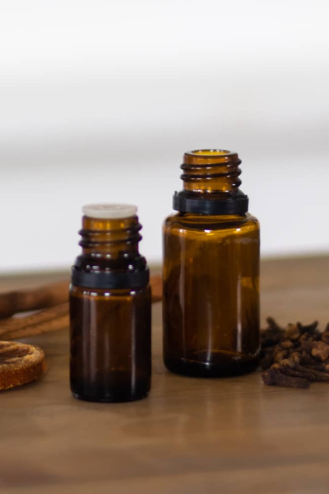 empty essential oil bottles on table