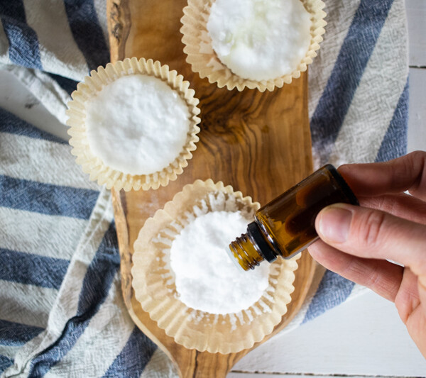 dropping essential oils on shower melts