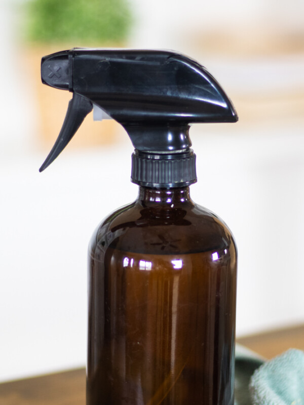 homemade cleaning product in glass spray bottle.