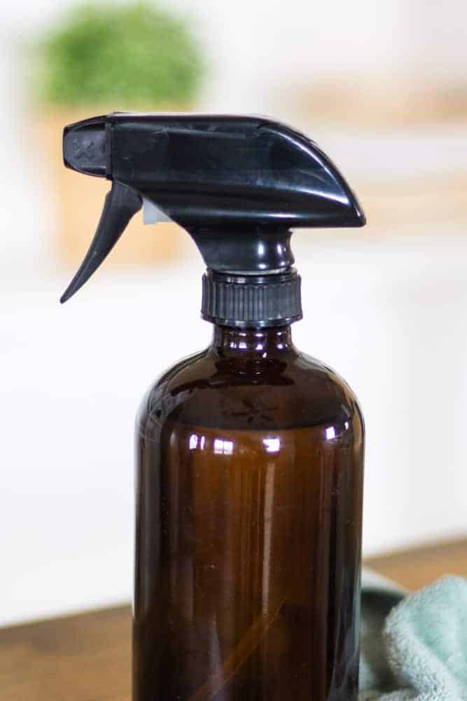 all purpose homemade cleaning product in glass spray bottle