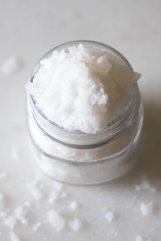 magnesium flakes in mason jar on white countertop