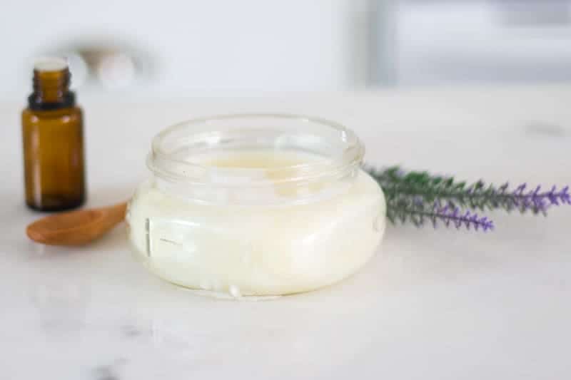 burn ointment with essential oils a wooden spoon and lavender