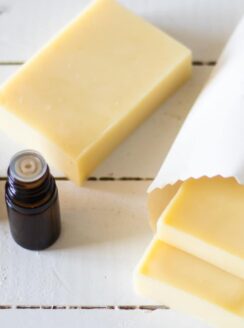 Non greasy hair conditioning bars drying on a wooden table.