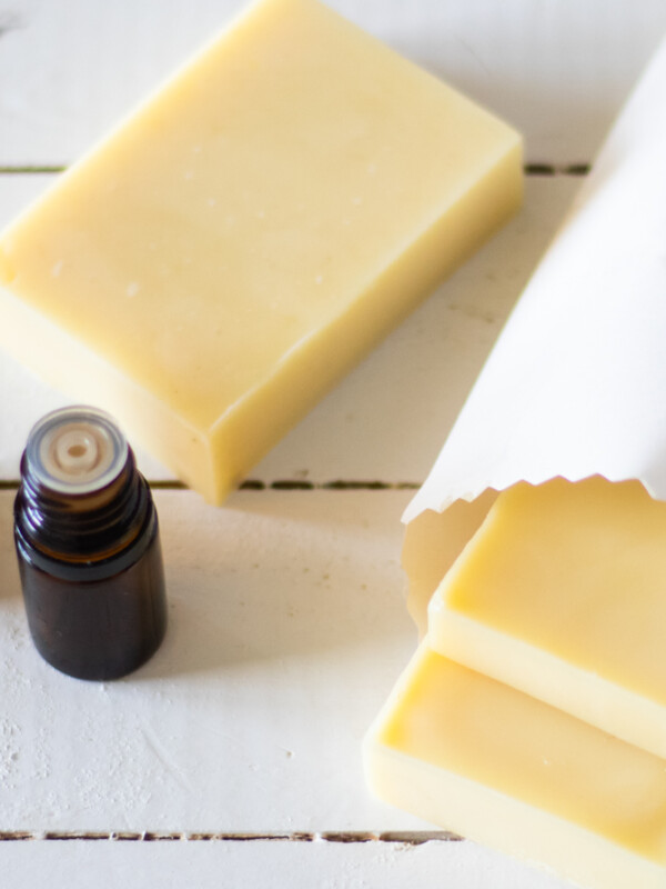 Non greasy hair conditioning bars drying on a wooden table.