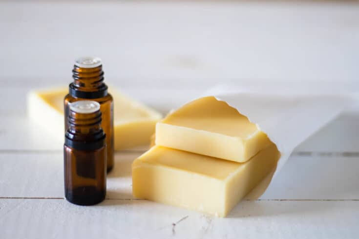 Homemade conditioner bars in a white storage pouch.