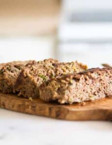 sliced zucchini bread on a cutting board.