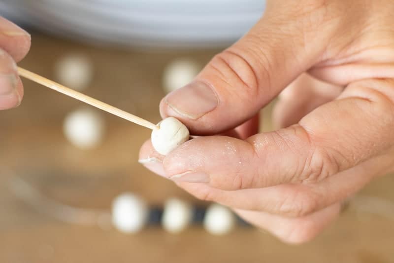 piercing small bead for a homemade bracelet 